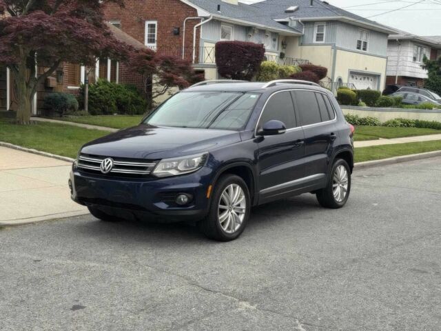 Синий Фольксваген Тигуан, объемом двигателя 2 л и пробегом 73 тыс. км за 9600 $, фото 2 на Automoto.ua