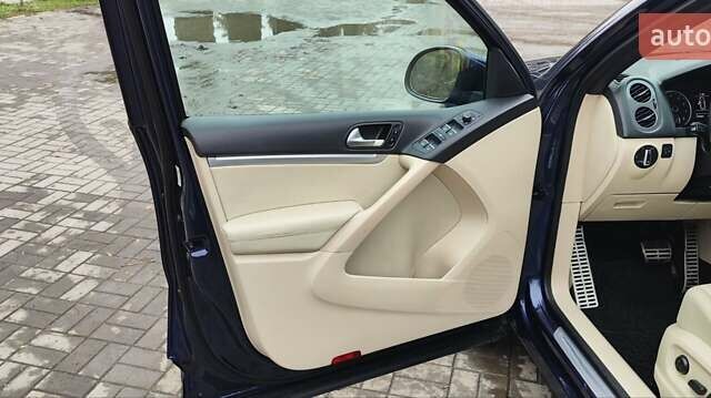 Синий Фольксваген Тигуан, объемом двигателя 2 л и пробегом 129 тыс. км за 12700 $, фото 38 на Automoto.ua