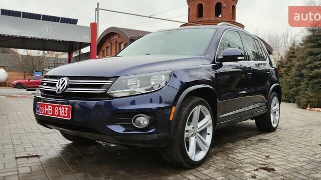 Синий Фольксваген Тигуан, объемом двигателя 2 л и пробегом 129 тыс. км за 12700 $, фото 3 на Automoto.ua