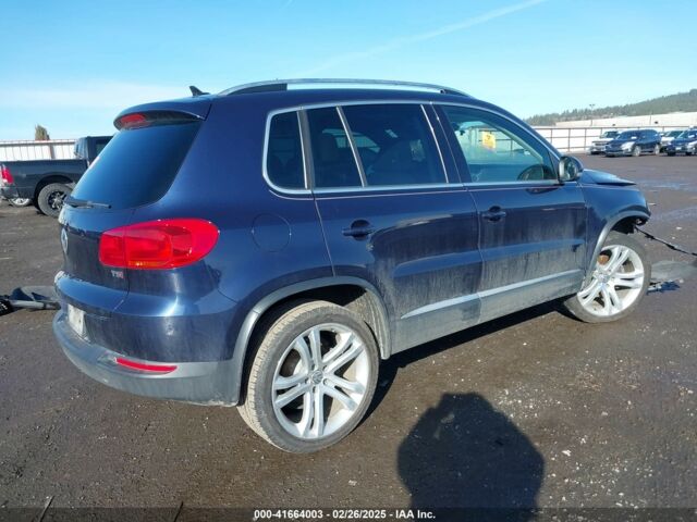 Синий Фольксваген Тигуан, объемом двигателя 2 л и пробегом 140 тыс. км за 9350 $, фото 5 на Automoto.ua