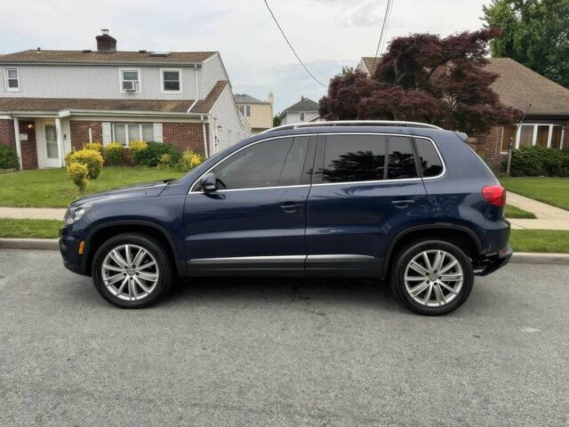 Синий Фольксваген Тигуан, объемом двигателя 2 л и пробегом 73 тыс. км за 9600 $, фото 3 на Automoto.ua