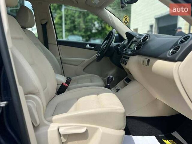 Синій Фольксваген Тігуан, об'ємом двигуна 2 л та пробігом 129 тис. км за 14500 $, фото 21 на Automoto.ua