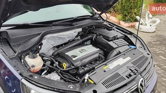 Синий Фольксваген Тигуан, объемом двигателя 2 л и пробегом 129 тыс. км за 12700 $, фото 61 на Automoto.ua