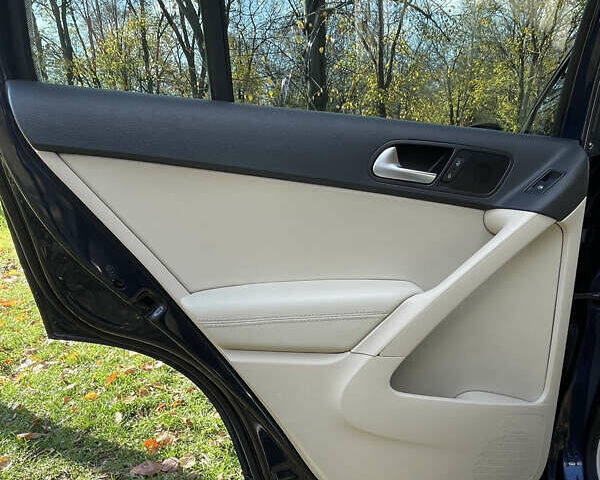 Синий Фольксваген Тигуан, объемом двигателя 1.98 л и пробегом 159 тыс. км за 13500 $, фото 14 на Automoto.ua