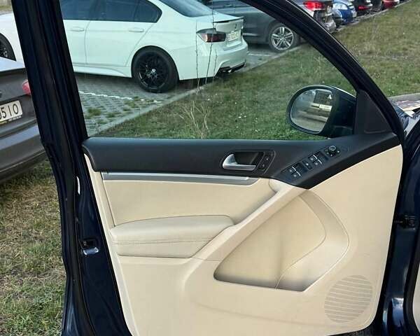 Синий Фольксваген Тигуан, объемом двигателя 2 л и пробегом 129 тыс. км за 14100 $, фото 25 на Automoto.ua