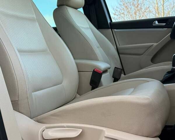 Синий Фольксваген Тигуан, объемом двигателя 2 л и пробегом 129 тыс. км за 14100 $, фото 36 на Automoto.ua