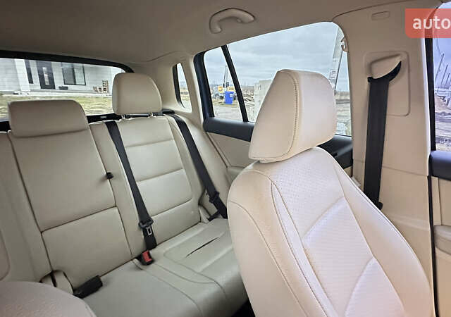 Синій Фольксваген Тігуан, об'ємом двигуна 1.98 л та пробігом 128 тис. км за 14300 $, фото 10 на Automoto.ua