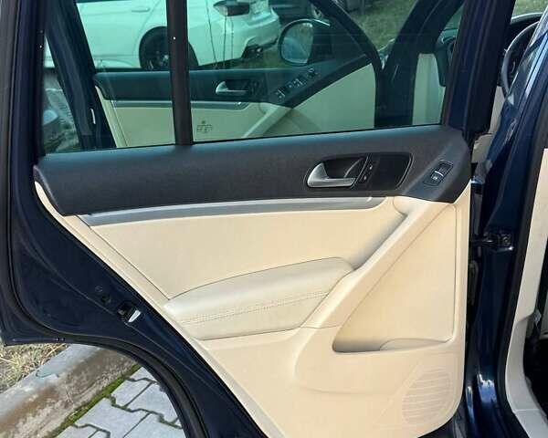 Синий Фольксваген Тигуан, объемом двигателя 2 л и пробегом 129 тыс. км за 14100 $, фото 28 на Automoto.ua