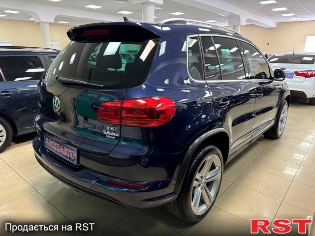 Синий Фольксваген Тигуан, объемом двигателя 2 л и пробегом 70 тыс. км за 16000 $, фото 1 на Automoto.ua