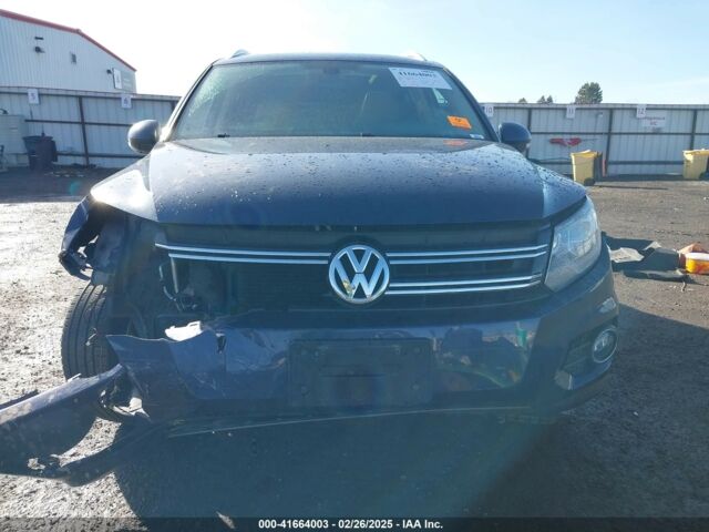 Синий Фольксваген Тигуан, объемом двигателя 2 л и пробегом 140 тыс. км за 9350 $, фото 1 на Automoto.ua