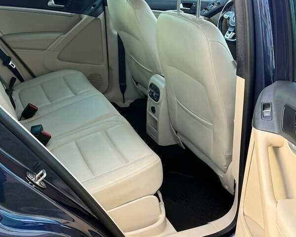 Синий Фольксваген Тигуан, объемом двигателя 2 л и пробегом 129 тыс. км за 14100 $, фото 35 на Automoto.ua