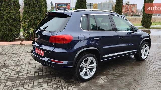 Синий Фольксваген Тигуан, объемом двигателя 2 л и пробегом 129 тыс. км за 12700 $, фото 13 на Automoto.ua