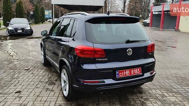 Синий Фольксваген Тигуан, объемом двигателя 2 л и пробегом 129 тыс. км за 12700 $, фото 24 на Automoto.ua