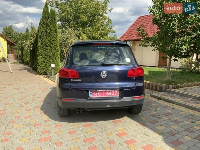 Синій Фольксваген Тігуан, об'ємом двигуна 2 л та пробігом 286 тис. км за 9500 $, фото 4 на Automoto.ua