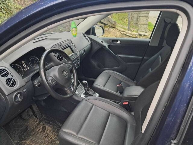 Синій Фольксваген Тігуан, об'ємом двигуна 2 л та пробігом 144 тис. км за 13800 $, фото 4 на Automoto.ua