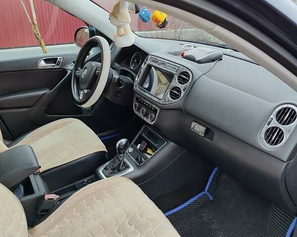 Синий Фольксваген Тигуан, объемом двигателя 1.98 л и пробегом 194 тыс. км за 14500 $, фото 5 на Automoto.ua