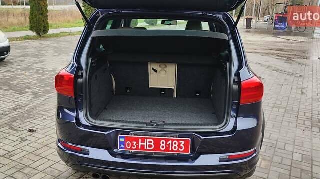 Синий Фольксваген Тигуан, объемом двигателя 2 л и пробегом 129 тыс. км за 12700 $, фото 57 на Automoto.ua