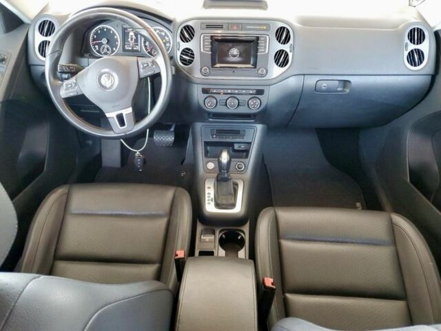 Синий Фольксваген Тигуан, объемом двигателя 2 л и пробегом 130 тыс. км за 9600 $, фото 4 на Automoto.ua