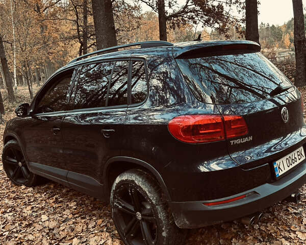 Синий Фольксваген Тигуан, объемом двигателя 1.98 л и пробегом 169 тыс. км за 12489 $, фото 14 на Automoto.ua