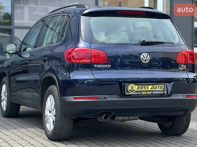 Синій Фольксваген Тігуан, об'ємом двигуна 2 л та пробігом 129 тис. км за 14500 $, фото 3 на Automoto.ua