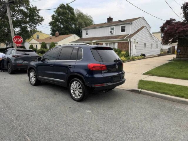 Синий Фольксваген Тигуан, объемом двигателя 2 л и пробегом 73 тыс. км за 9600 $, фото 4 на Automoto.ua