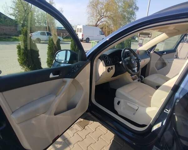 Синій Фольксваген Тігуан, об'ємом двигуна 2 л та пробігом 236 тис. км за 12900 $, фото 13 на Automoto.ua