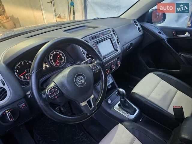Синий Фольксваген Тигуан, объемом двигателя 2 л и пробегом 152 тыс. км за 10700 $, фото 21 на Automoto.ua