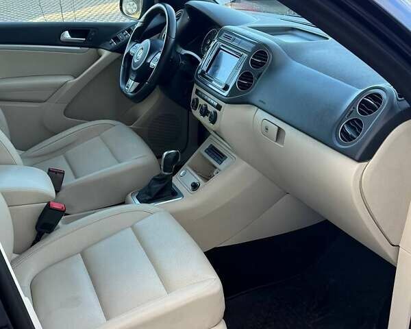 Синий Фольксваген Тигуан, объемом двигателя 2 л и пробегом 129 тыс. км за 14100 $, фото 39 на Automoto.ua