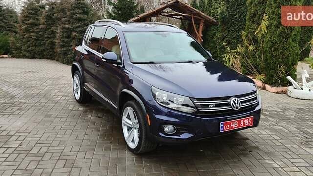 Синий Фольксваген Тигуан, объемом двигателя 2 л и пробегом 129 тыс. км за 12700 $, фото 2 на Automoto.ua