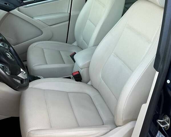 Синий Фольксваген Тигуан, объемом двигателя 2 л и пробегом 129 тыс. км за 14100 $, фото 24 на Automoto.ua