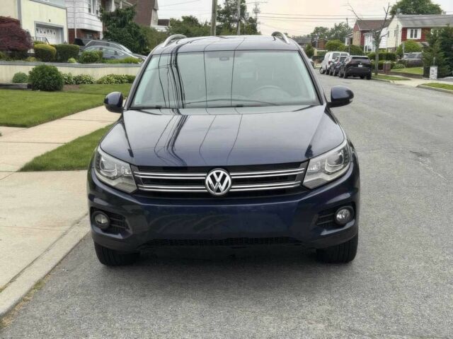 Синий Фольксваген Тигуан, объемом двигателя 2 л и пробегом 73 тыс. км за 9600 $, фото 1 на Automoto.ua