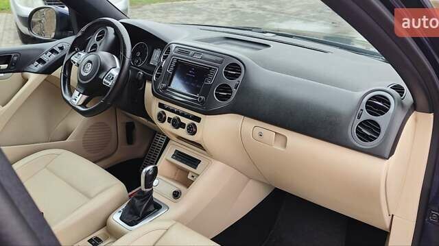 Синий Фольксваген Тигуан, объемом двигателя 2 л и пробегом 129 тыс. км за 12700 $, фото 49 на Automoto.ua