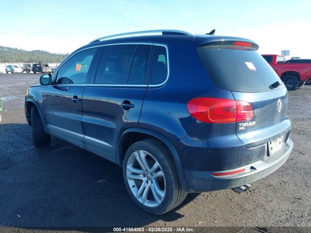 Синий Фольксваген Тигуан, объемом двигателя 2 л и пробегом 140 тыс. км за 9350 $, фото 3 на Automoto.ua