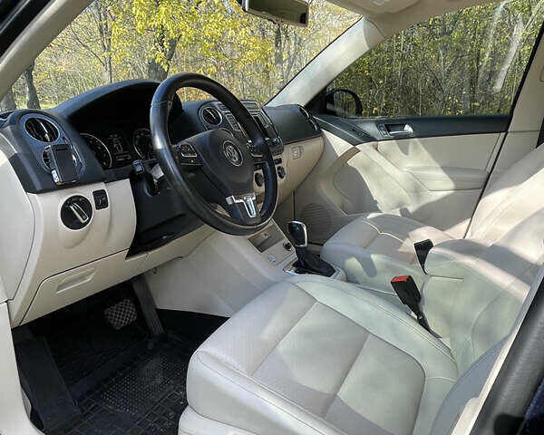 Синий Фольксваген Тигуан, объемом двигателя 1.98 л и пробегом 159 тыс. км за 13500 $, фото 11 на Automoto.ua