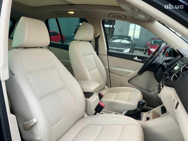 Синий Фольксваген Тигуан, объемом двигателя 2 л и пробегом 191 тыс. км за 14490 $, фото 39 на Automoto.ua