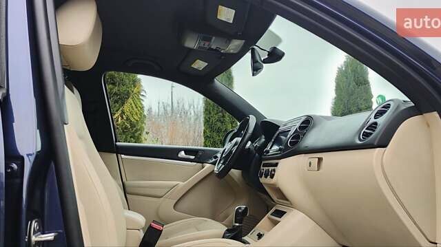 Синий Фольксваген Тигуан, объемом двигателя 2 л и пробегом 129 тыс. км за 12700 $, фото 51 на Automoto.ua