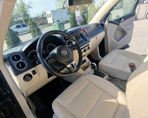 Синій Фольксваген Тігуан, об'ємом двигуна 2 л та пробігом 236 тис. км за 12900 $, фото 1 на Automoto.ua