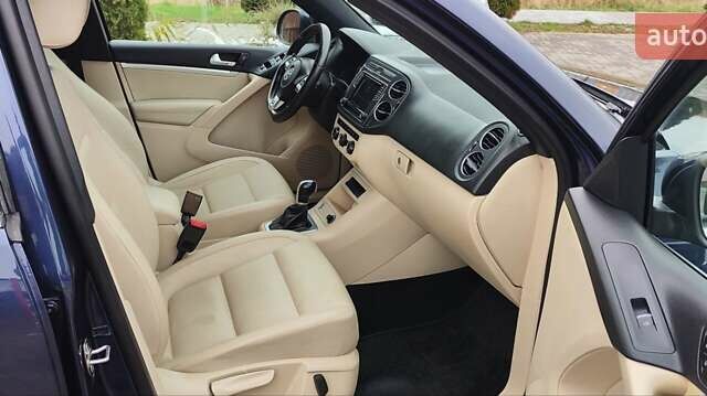 Синий Фольксваген Тигуан, объемом двигателя 2 л и пробегом 129 тыс. км за 12700 $, фото 50 на Automoto.ua