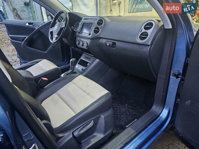 Синий Фольксваген Тигуан, объемом двигателя 2 л и пробегом 152 тыс. км за 10700 $, фото 27 на Automoto.ua