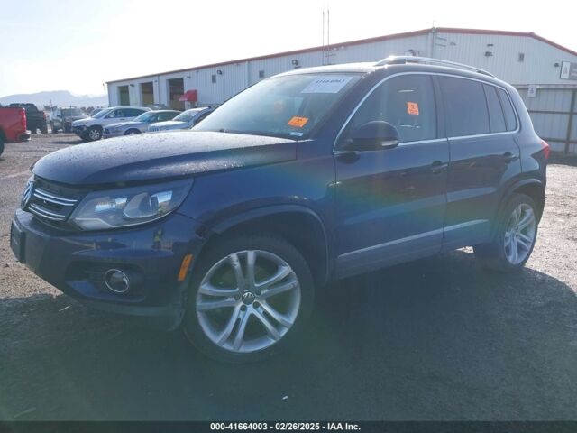 Синий Фольксваген Тигуан, объемом двигателя 2 л и пробегом 140 тыс. км за 9350 $, фото 2 на Automoto.ua