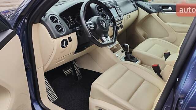 Синий Фольксваген Тигуан, объемом двигателя 2 л и пробегом 129 тыс. км за 12700 $, фото 39 на Automoto.ua