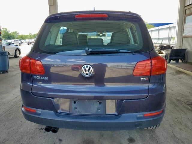 Синий Фольксваген Тигуан, объемом двигателя 2 л и пробегом 130 тыс. км за 9600 $, фото 2 на Automoto.ua