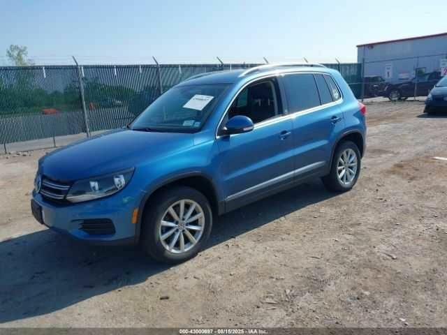 Синий Фольксваген Тигуан, объемом двигателя 2 л и пробегом 63 тыс. км за 1800 $, фото 1 на Automoto.ua