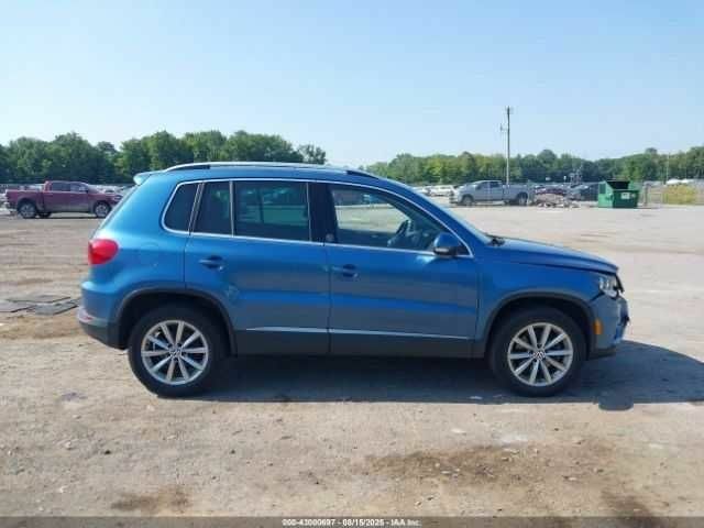 Синий Фольксваген Тигуан, объемом двигателя 2 л и пробегом 63 тыс. км за 1800 $, фото 12 на Automoto.ua