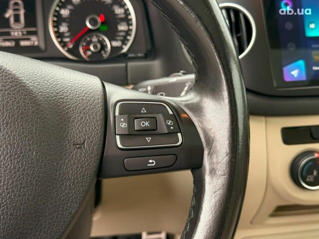 Синий Фольксваген Тигуан, объемом двигателя 2 л и пробегом 76 тыс. км за 18590 $, фото 21 на Automoto.ua