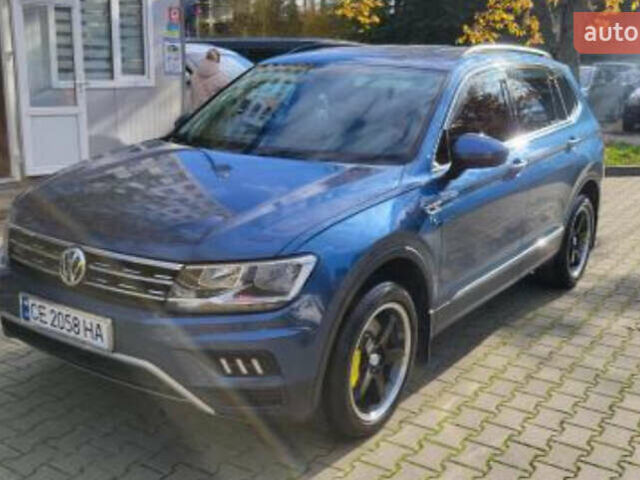 Синій Фольксваген Тігуан, об'ємом двигуна 1.98 л та пробігом 124 тис. км за 16000 $, фото 2 на Automoto.ua