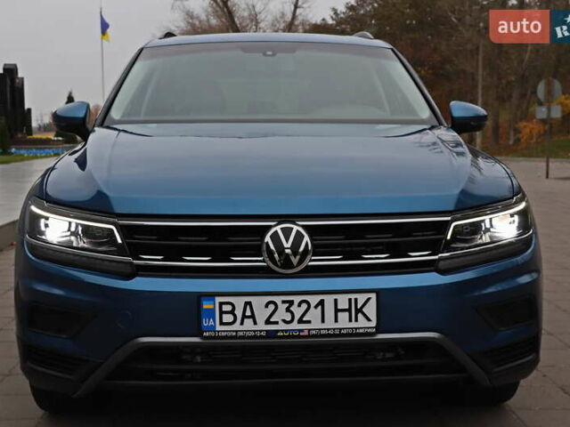 Синий Фольксваген Тигуан, объемом двигателя 2 л и пробегом 149 тыс. км за 18555 $, фото 1 на Automoto.ua