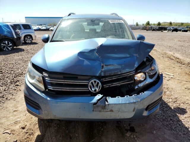 Синий Фольксваген Тигуан, объемом двигателя 2 л и пробегом 103 тыс. км за 9500 $, фото 1 на Automoto.ua