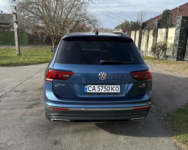 Синій Фольксваген Тігуан, об'ємом двигуна 1.98 л та пробігом 93 тис. км за 19500 $, фото 6 на Automoto.ua