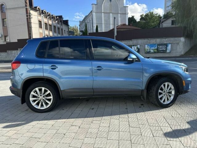 Синій Фольксваген Тігуан, об'ємом двигуна 2 л та пробігом 77 тис. км за 14500 $, фото 2 на Automoto.ua